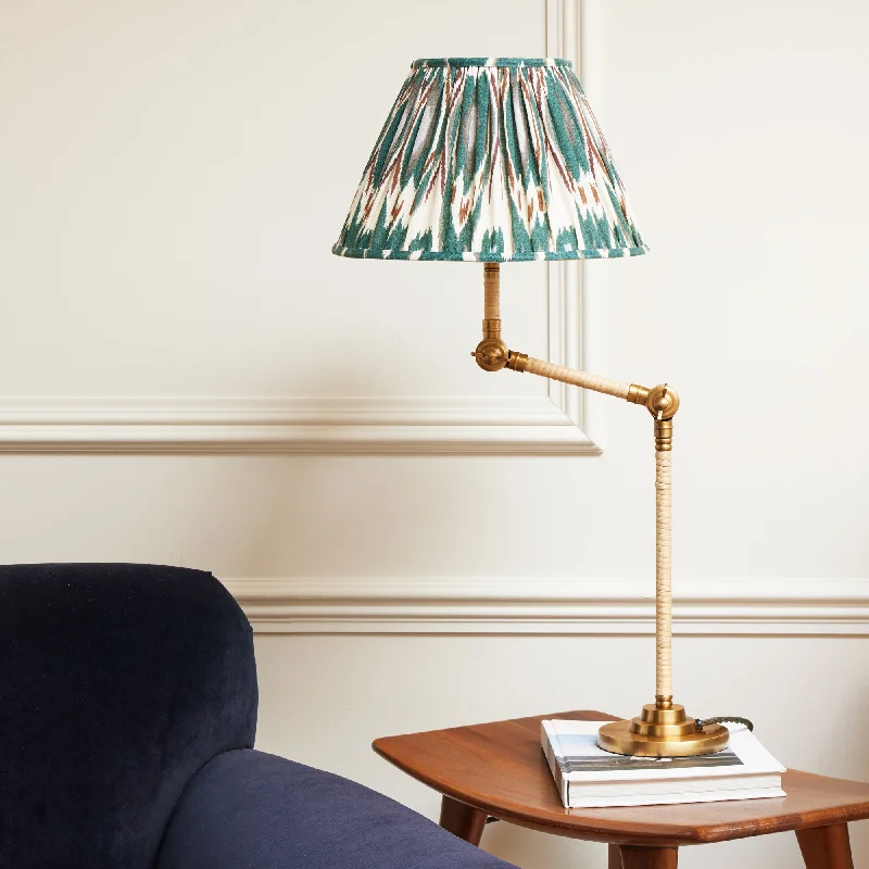 Abel table lamp in brass and natural rattan