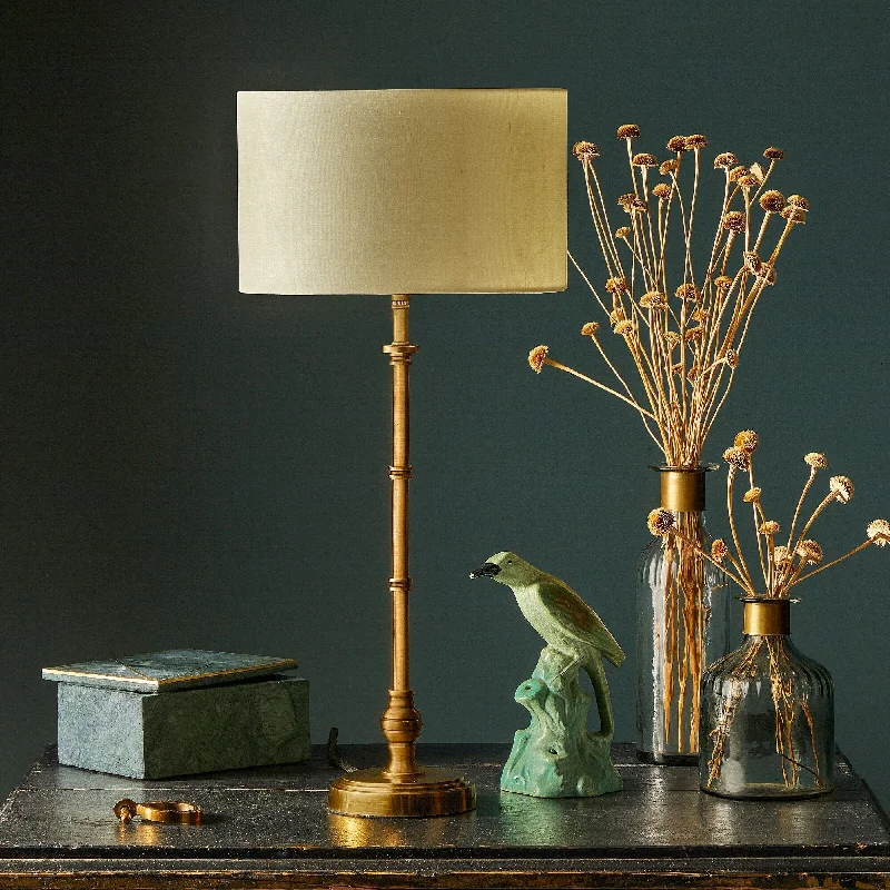 Chukka table lamp in antiqued brass