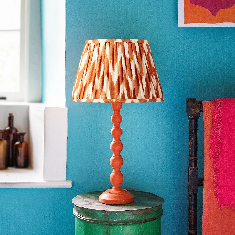 Lillee table lamp in wood with a orange finish