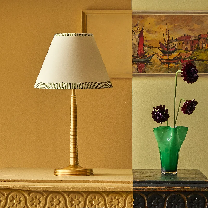 Ripple table lamp in antique brass